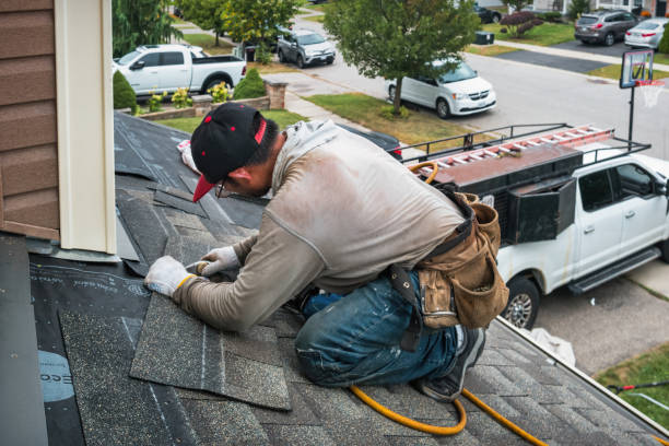 Professional Roofing technician working in West Decatur, PA